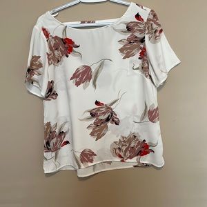 Flower patterned Dynamite blouse with V back.